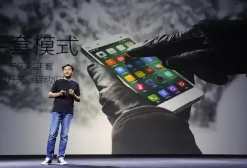 Facebook Diketahui Tertarik Investasi di Xiaomi 1 Lei Jun, founder and CEO of China's mobile company Xiaomi Inc, introduces the new features of Xiaomi Phone 4 at its launching ceremony, in Beijing