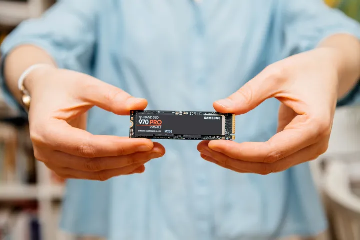 woman holding samsung nvme ssd